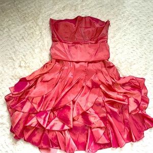 S but fits M as well. Fancy and chic dress. Used only once,color is iridescent.